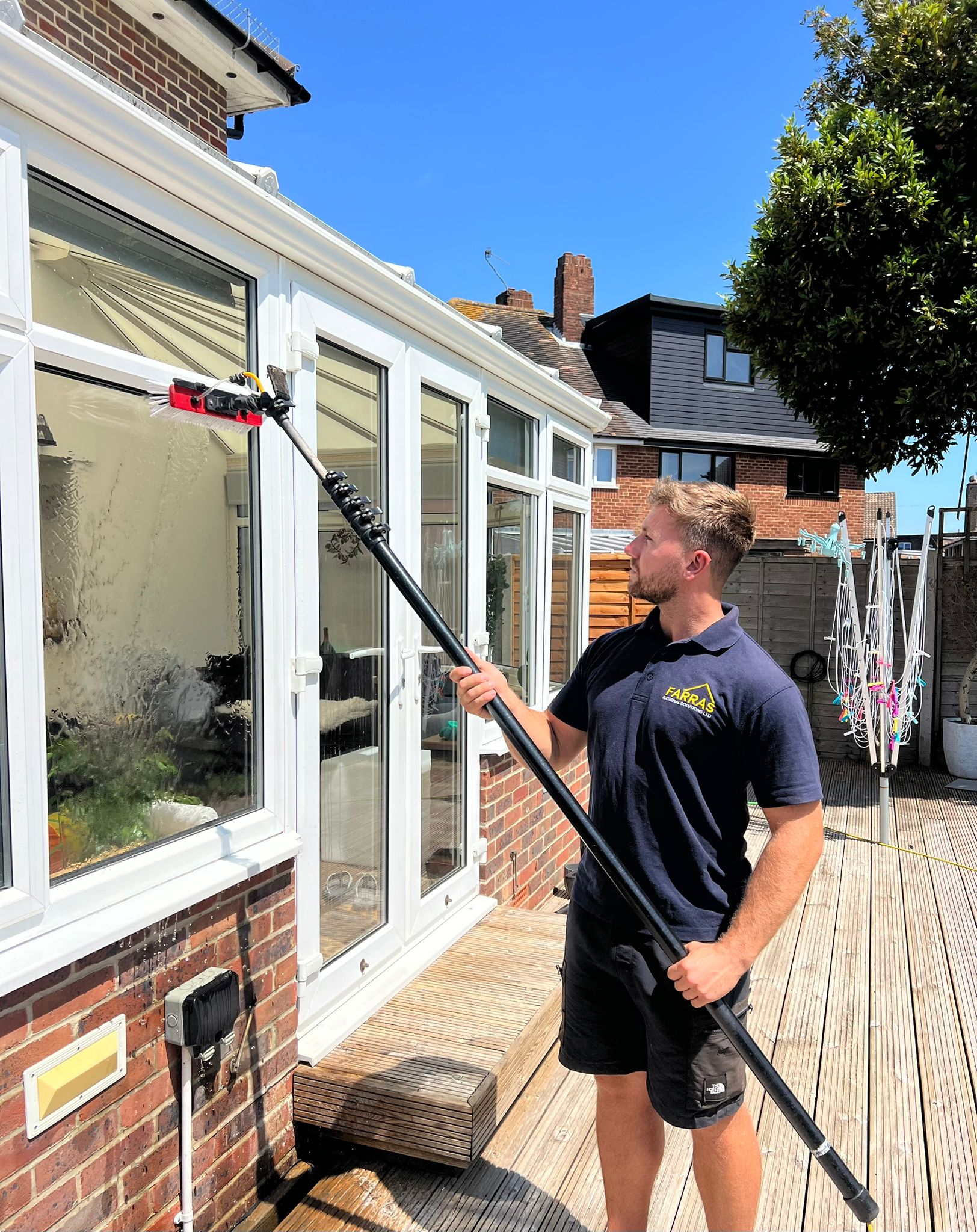 Professional window cleaning service in action